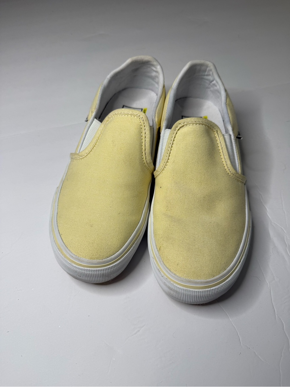 Vans Slip-On Sneakers in Pale Yellow and White